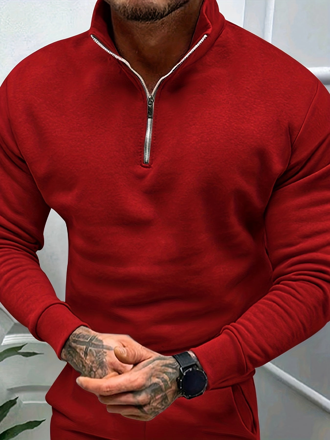 Black Aristo Merino half zip sweater with ribbed cuffs and a high neckline