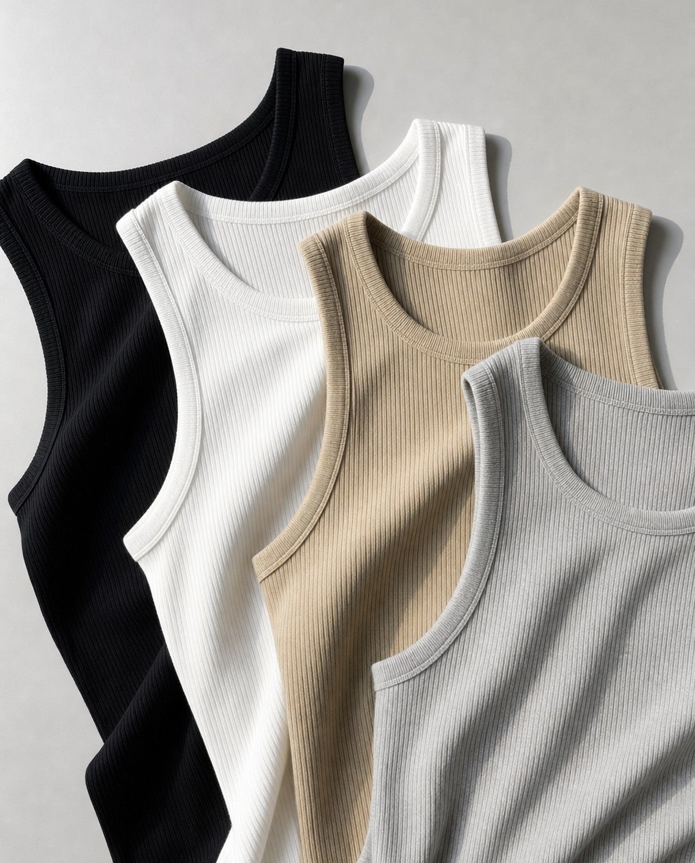 Apex fitted ribbed tank shown in all four colorways