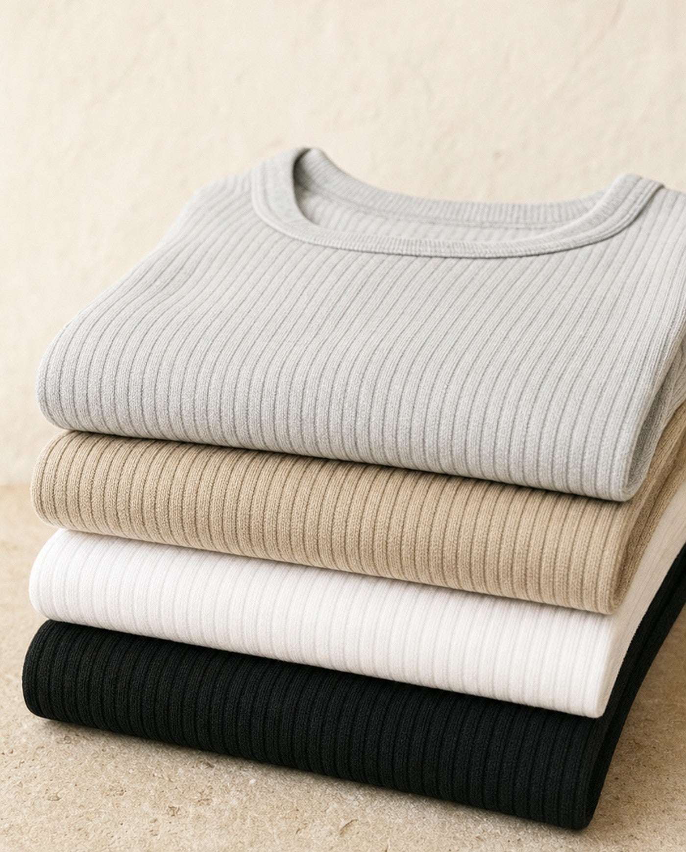 Apex fitted ribbed tank folded stack in all four colorways