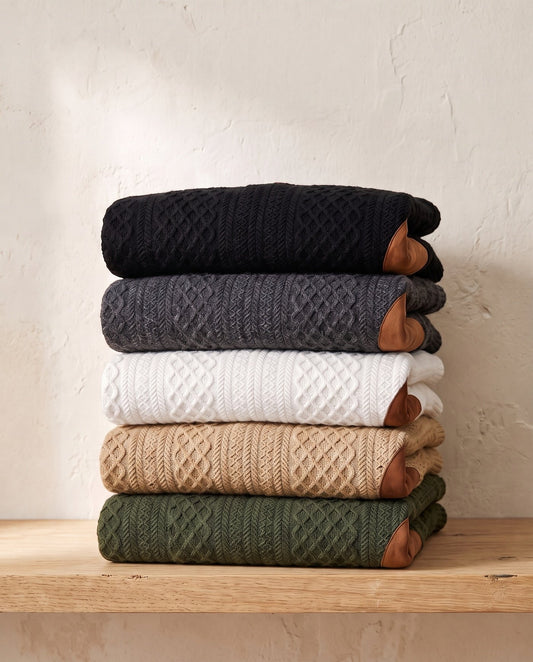 Warden jacquard sweaters stacked in all five colourways