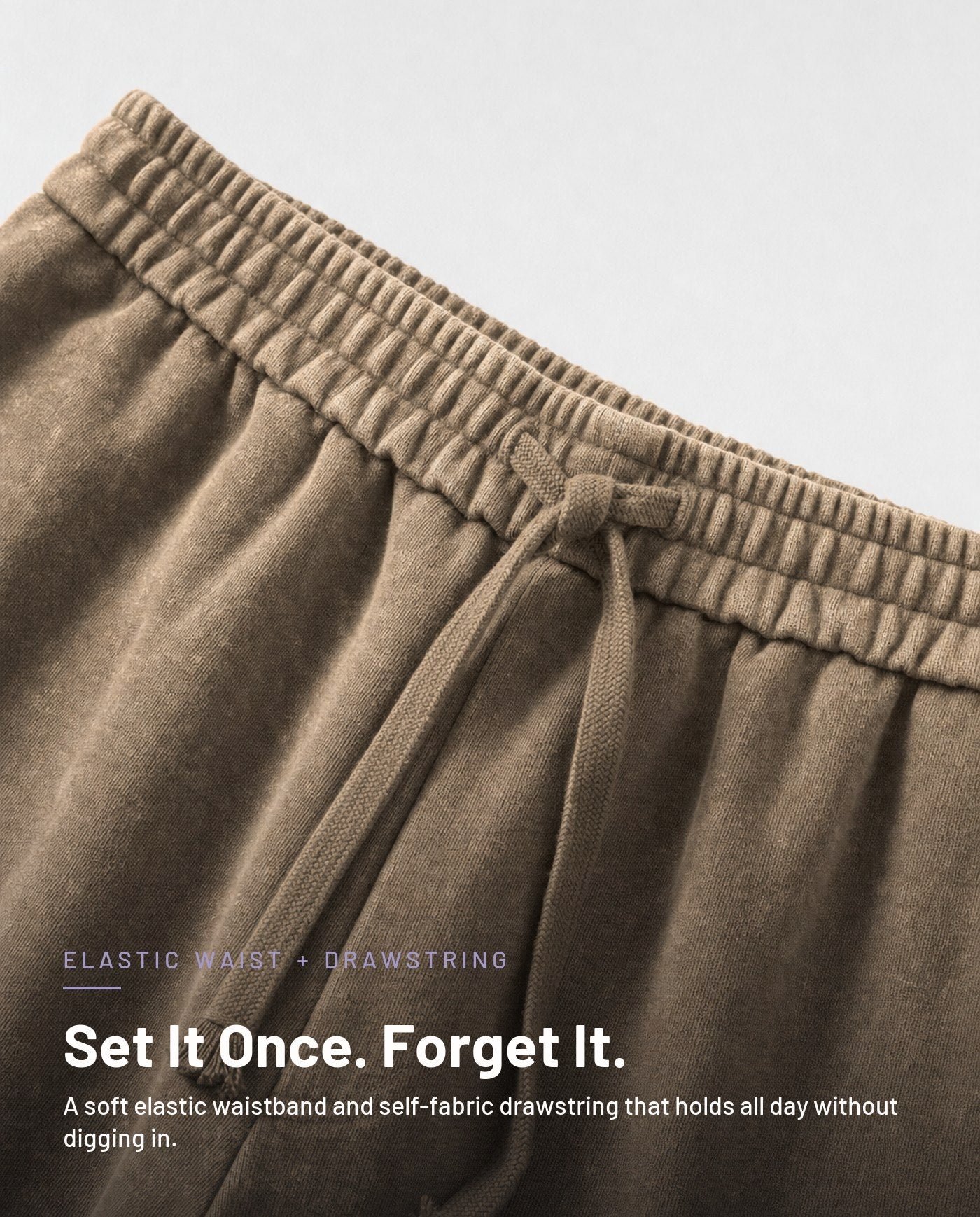 Elastic waistband and drawstring detail in washed camel