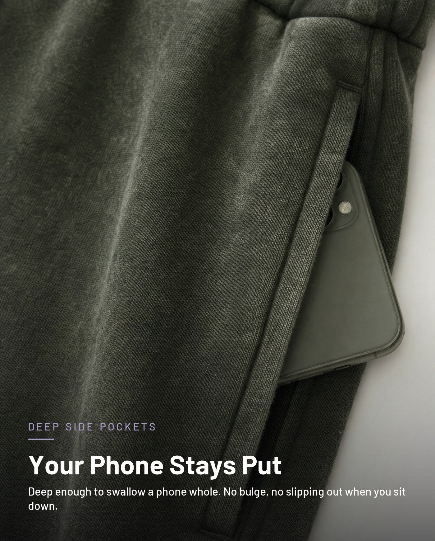 Deep side pocket holding a phone, washed army green