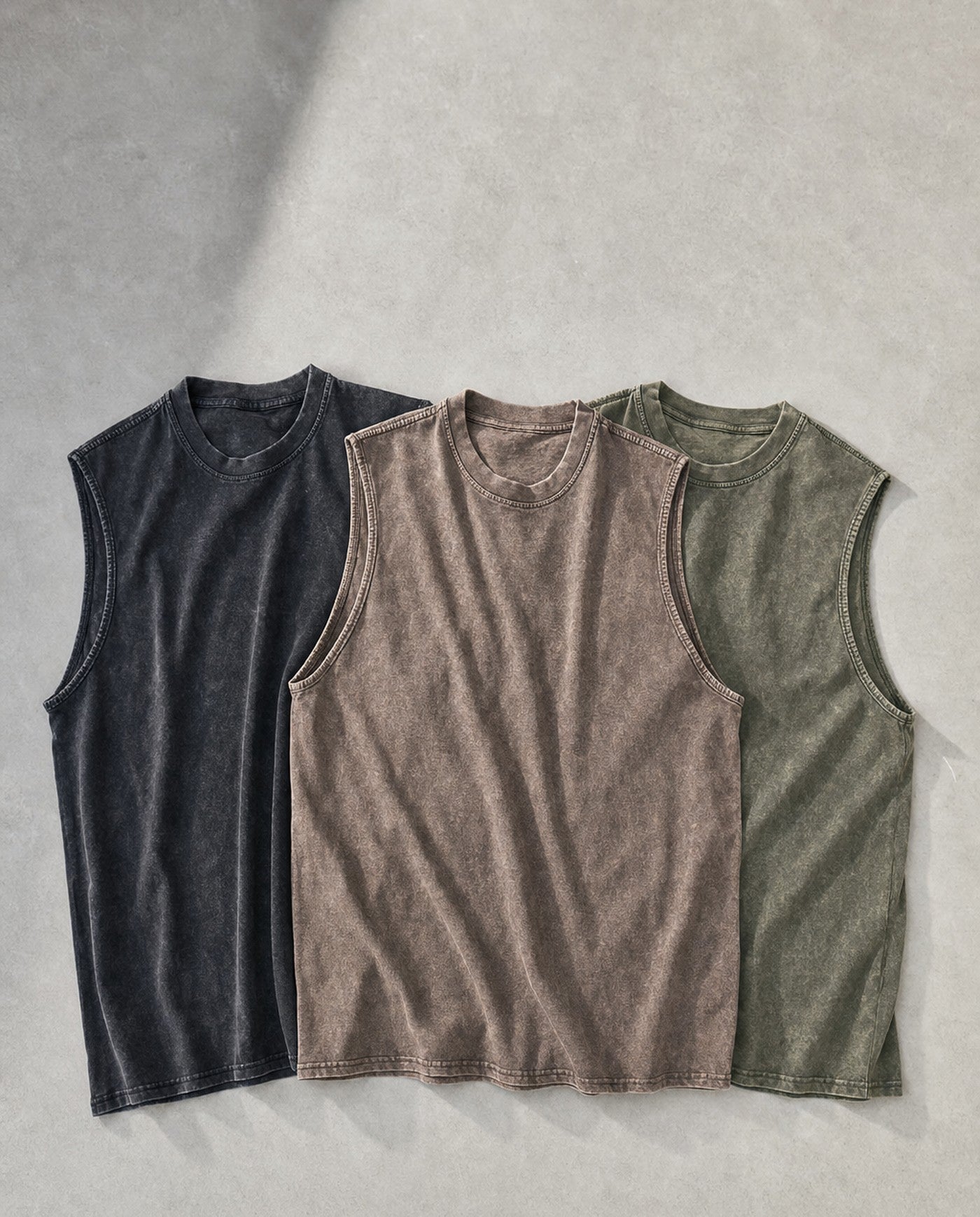 Ironclad oversized acid wash tank shown in three colorways