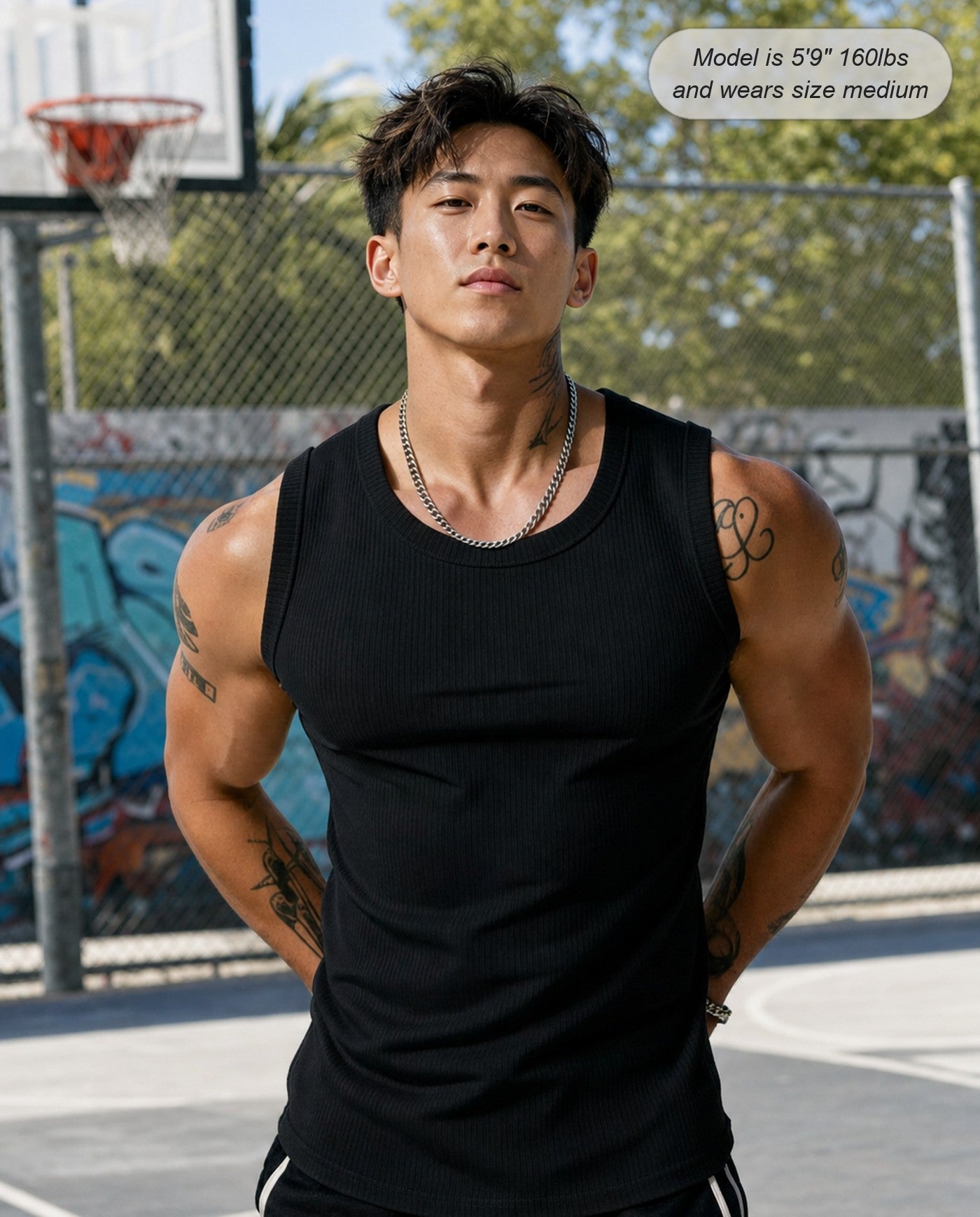 Man wearing the Apex ribbed tank in black at the court