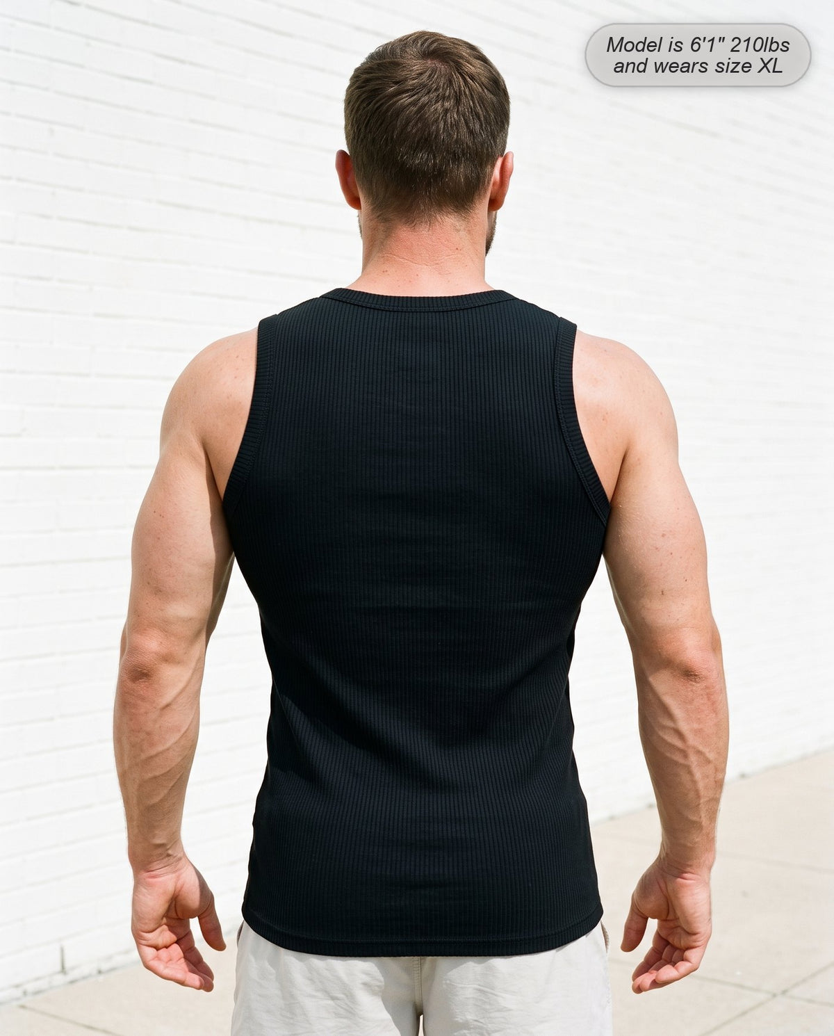 Back view of the Apex ribbed tank in black showing the high back coverage