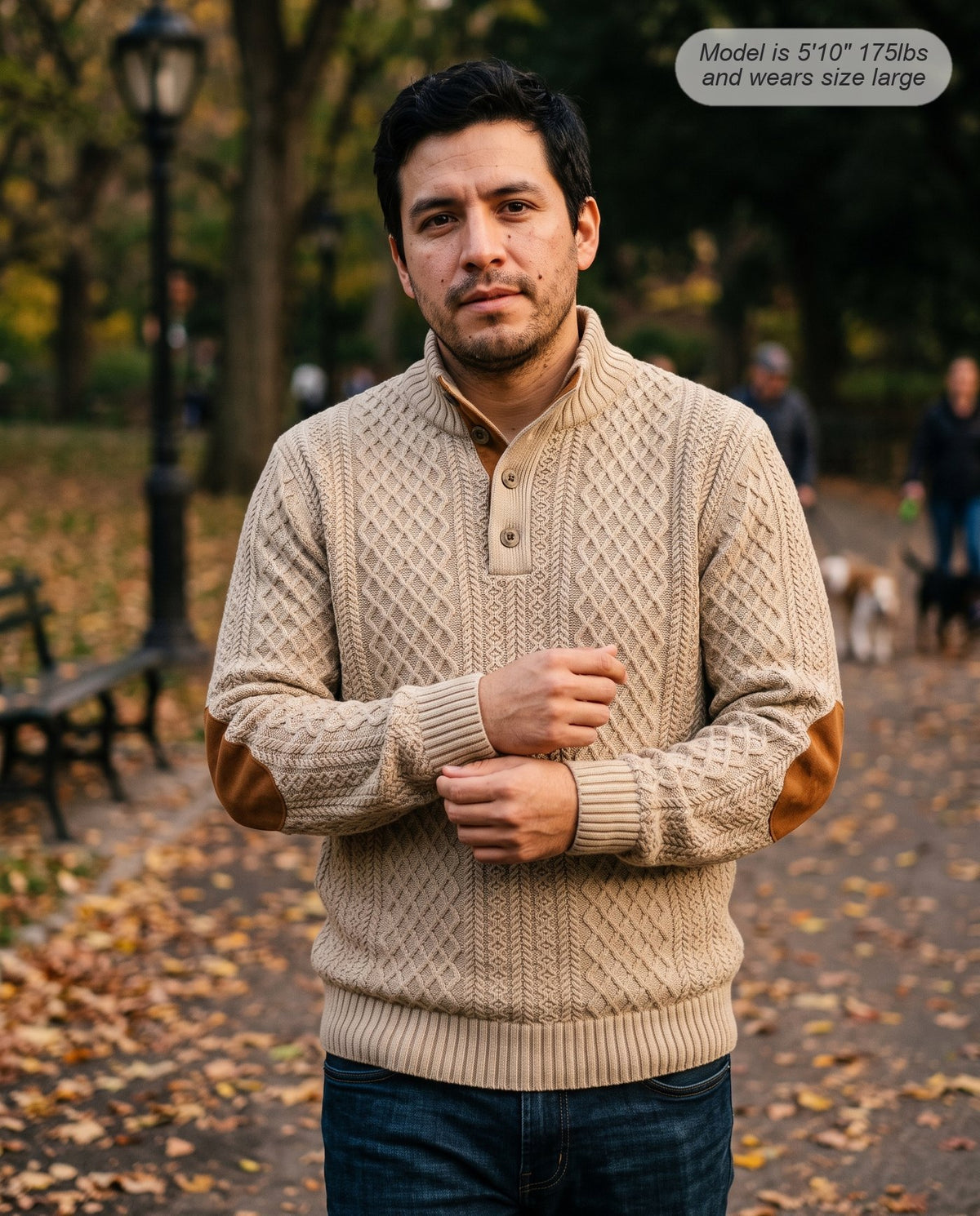 Man wearing the Bastion jacquard sweater in khaki on an autumn park path
