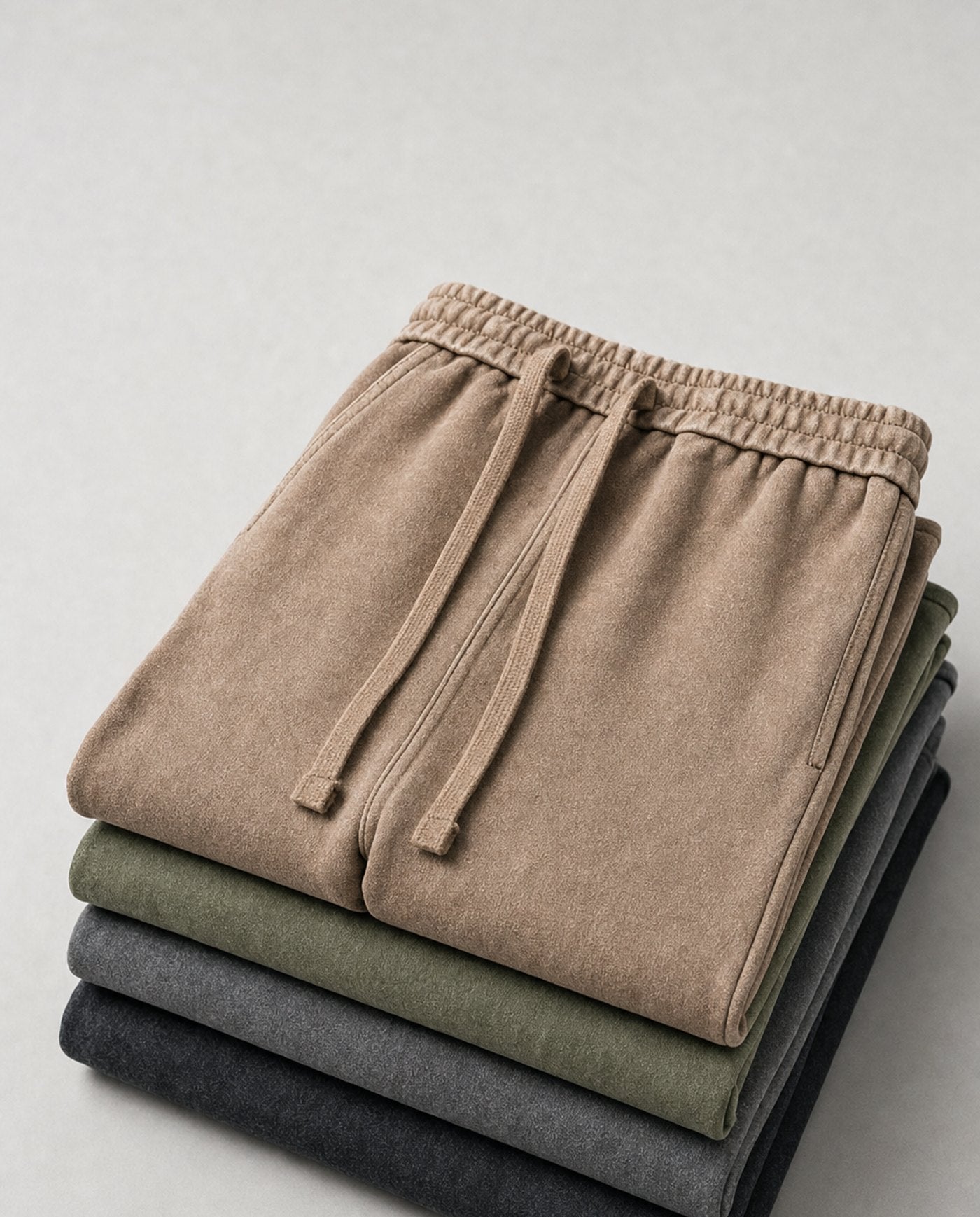 Citadel relaxed acid wash sweatpants folded stack in all four colourways