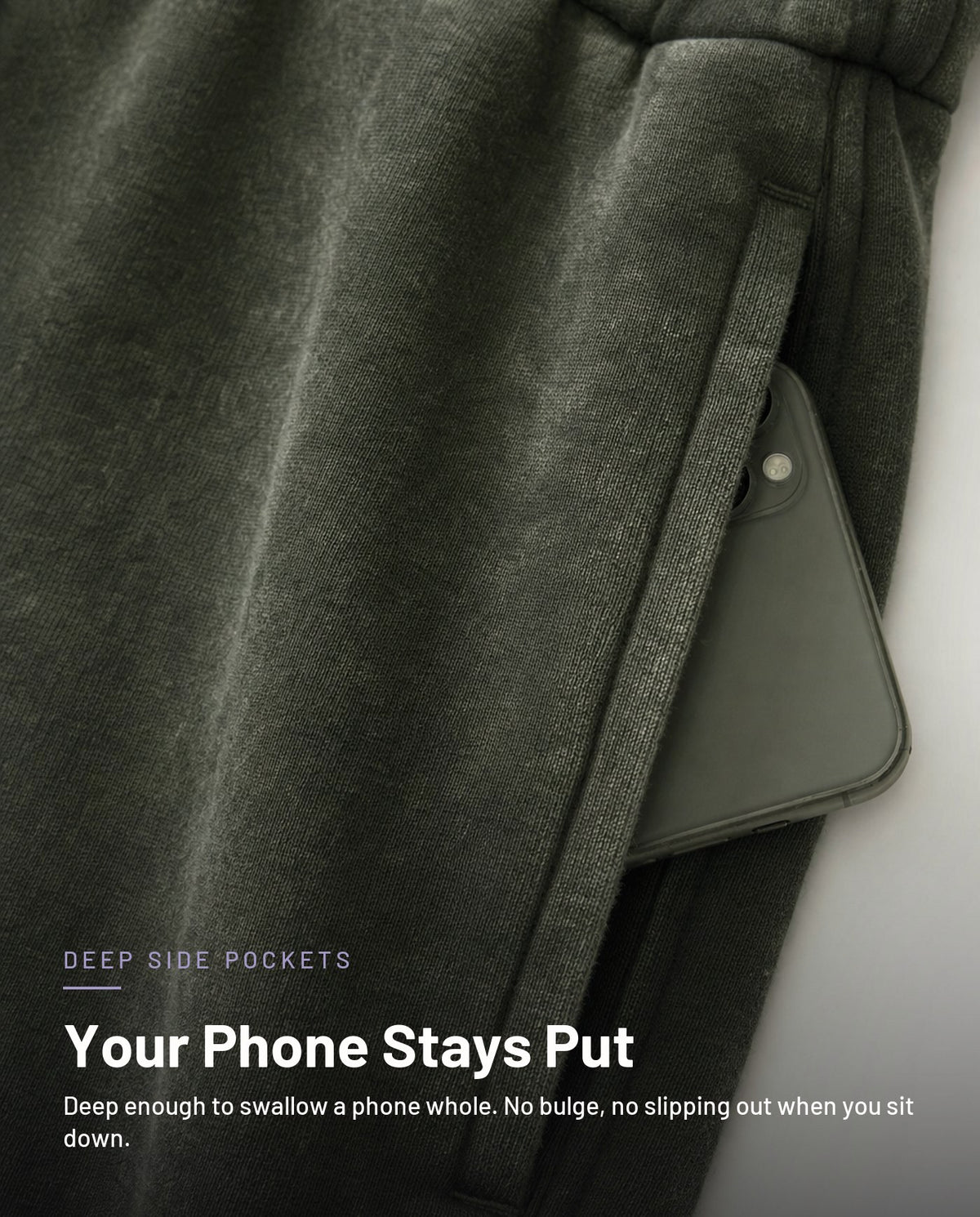 Deep side pocket holding a phone, washed army green