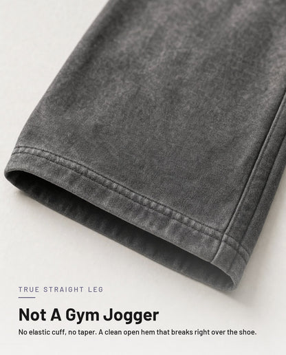 Open straight-leg hem detail in washed grey - no elastic cuff