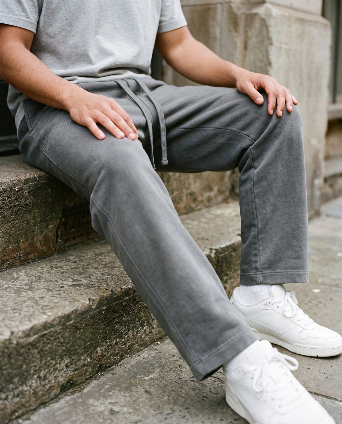 Seated view of the Citadel sweatpants in washed grey