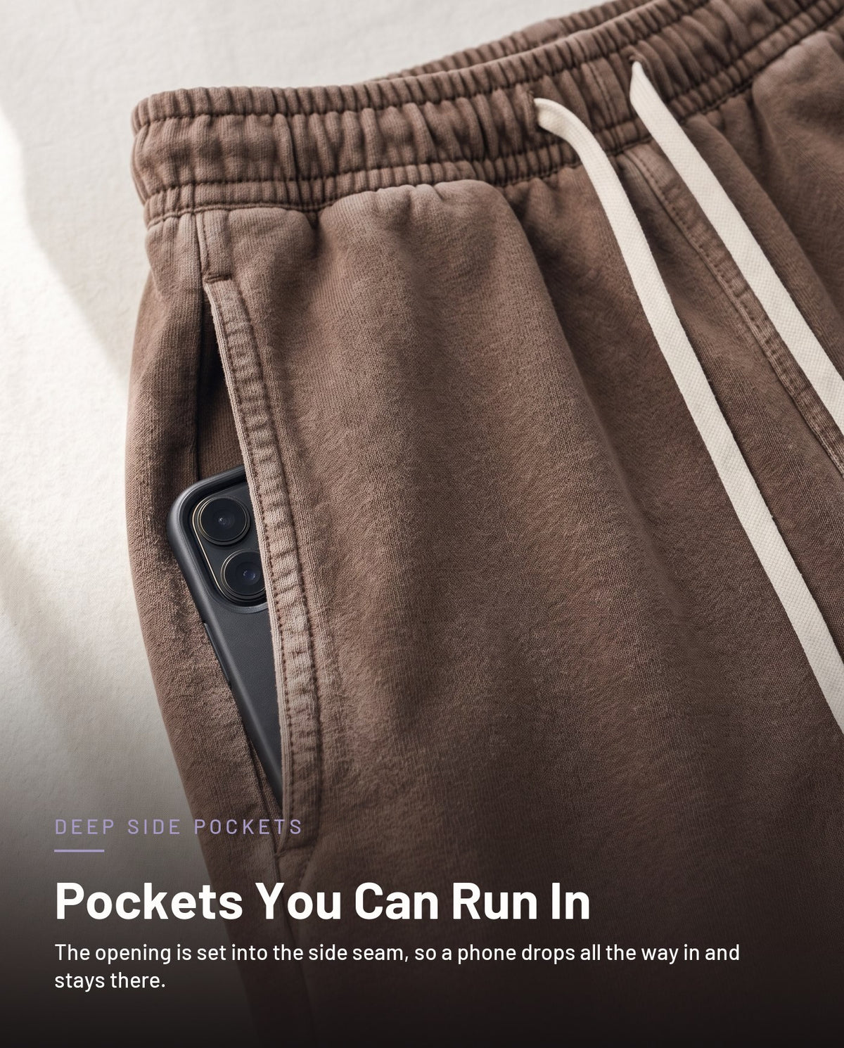 Deep side seam pocket detail in coffee brown