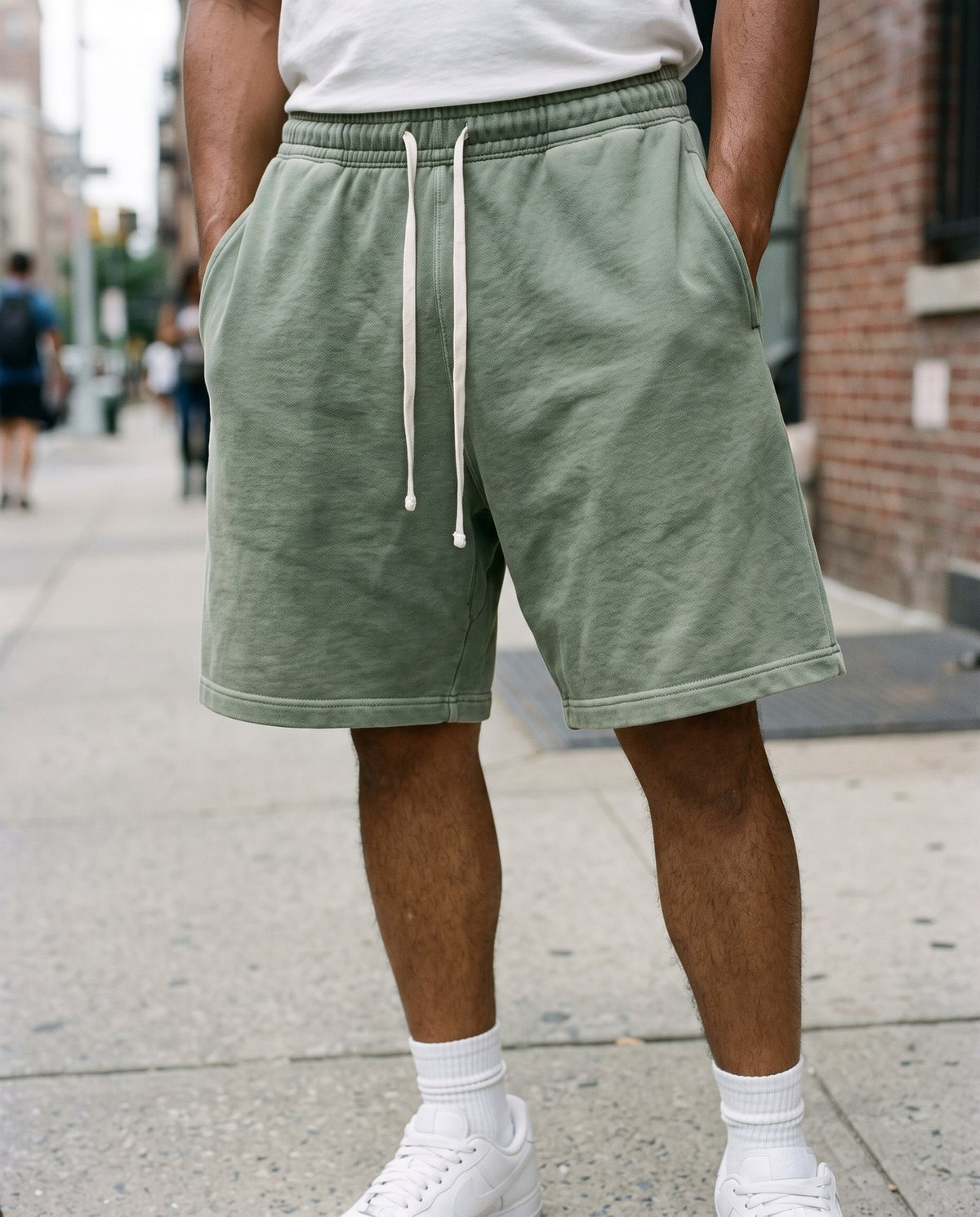 Low angle view of the Colossus baggy shorts in washed army green