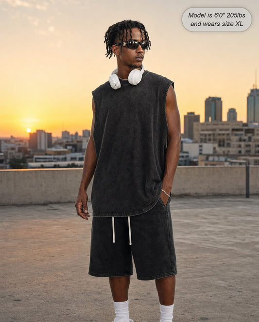 Man wearing the Ironclad acid wash tank in brown on a rooftop