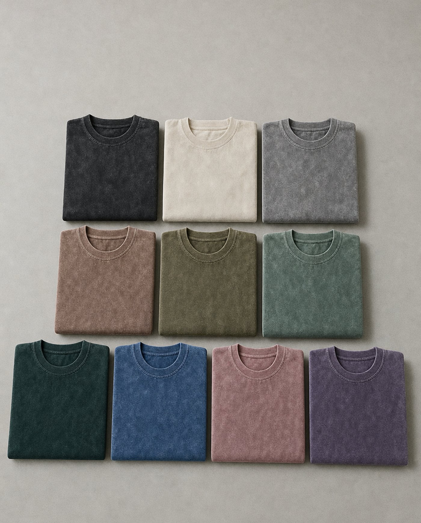 All ten Legion oversized acid wash tee colours folded and laid out