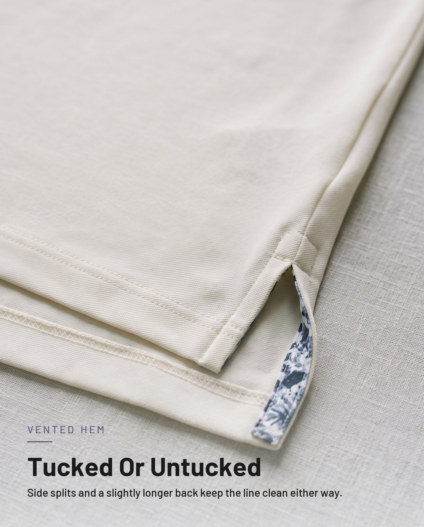 Side vent and hem detail in ivory