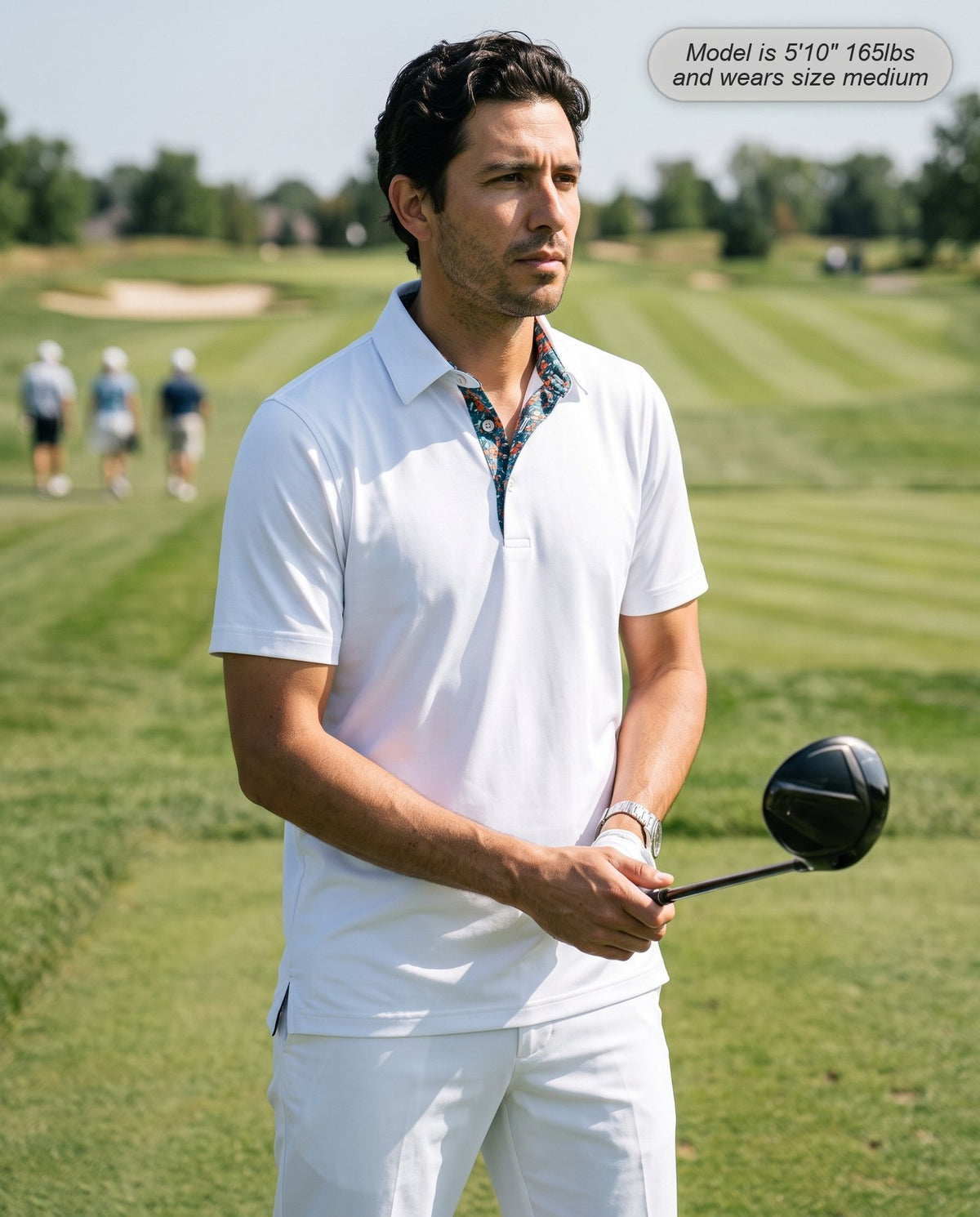 Man wearing the Meridian golf polo in white on the tee box